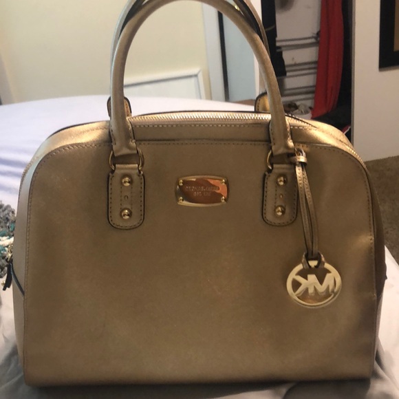 Gold Michael kors purse